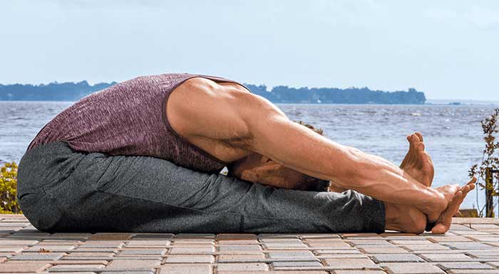 حالت خم جلو نشسته (Paschimottanasana - Seated Forward Bend)